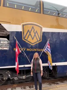 Lisa in front of a train