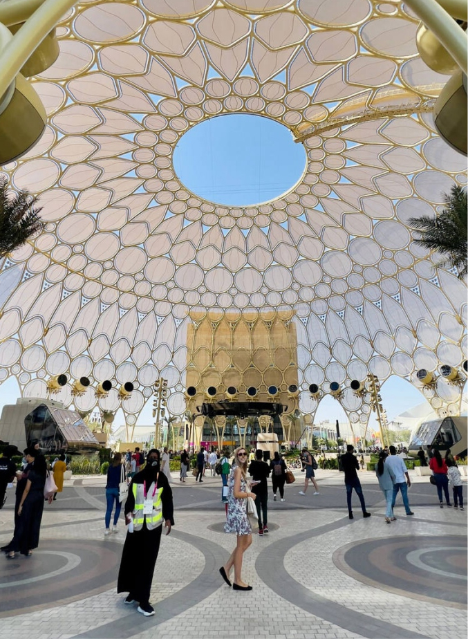 Tourists appreciating stunning architecture during a business travel trip booked by an expert corporate travel agency